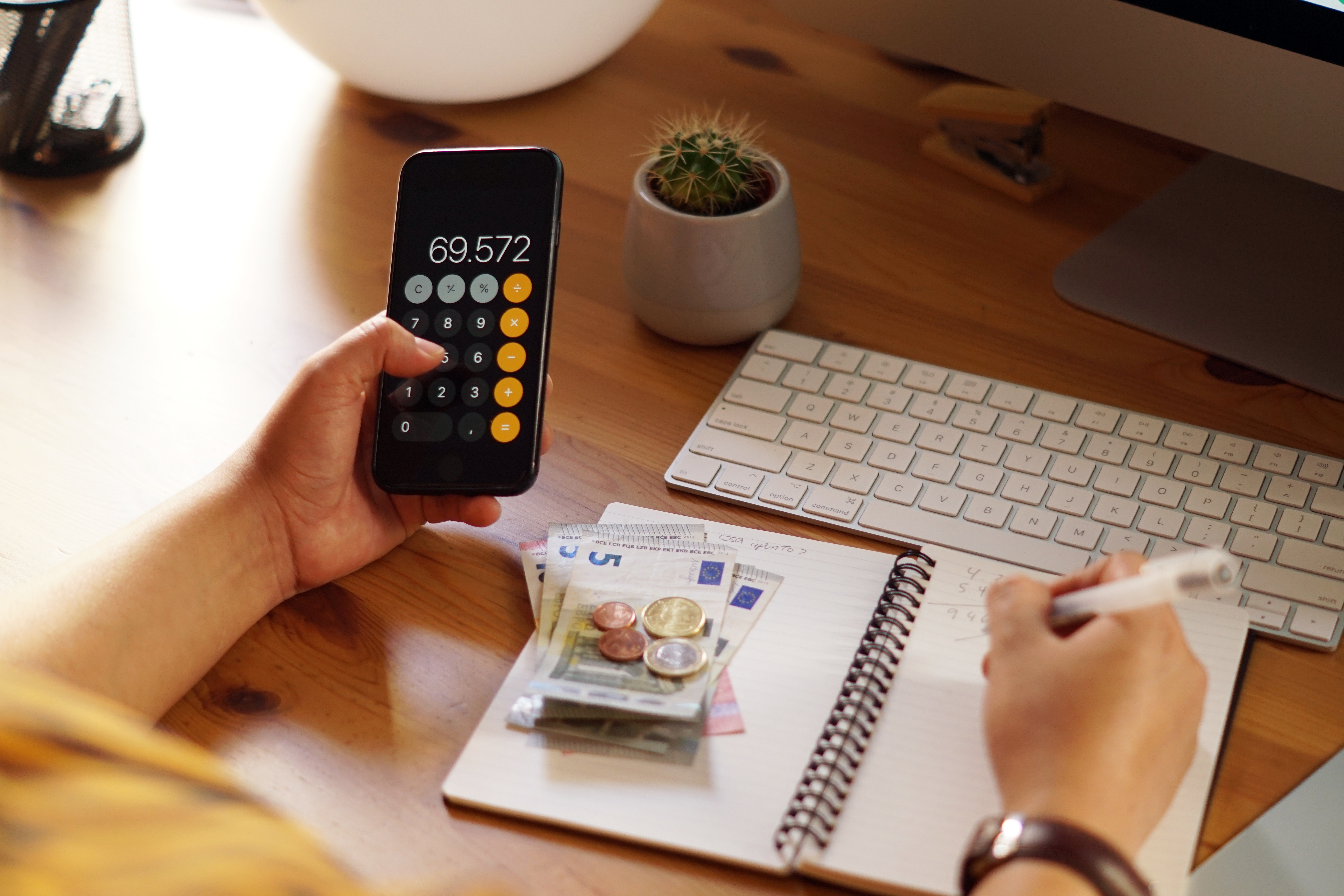 closeup-shot-of-an-entrepreneur-working-from-home-on-his-personal-finances-and-savings